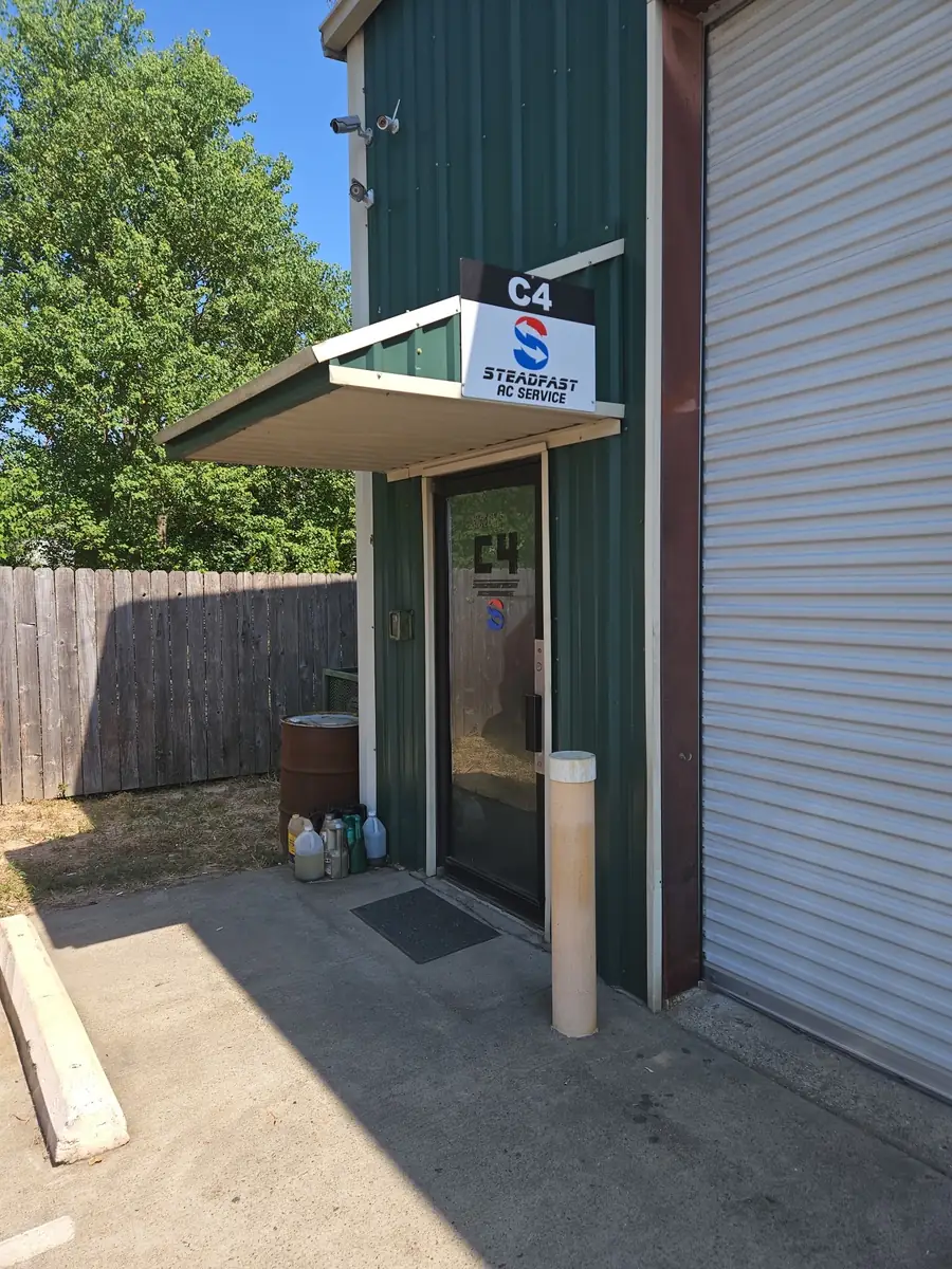 The Steadfast AC Service entrance at unit C4 on FM 2978 in Tomball, in bright daylight